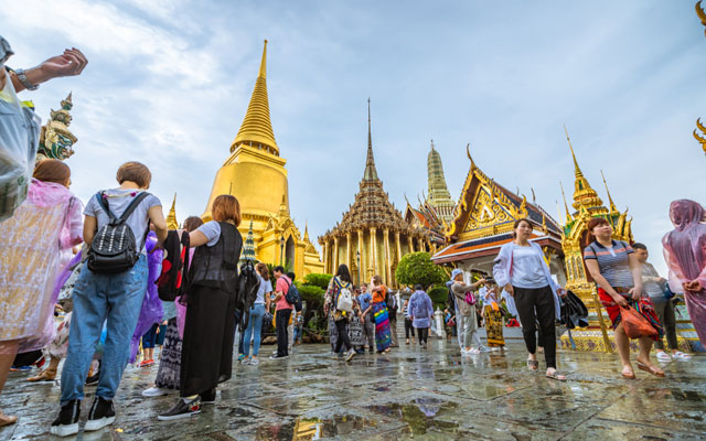 Chinese tourist in Wat Phra Kaew Grand Palace Bangkok